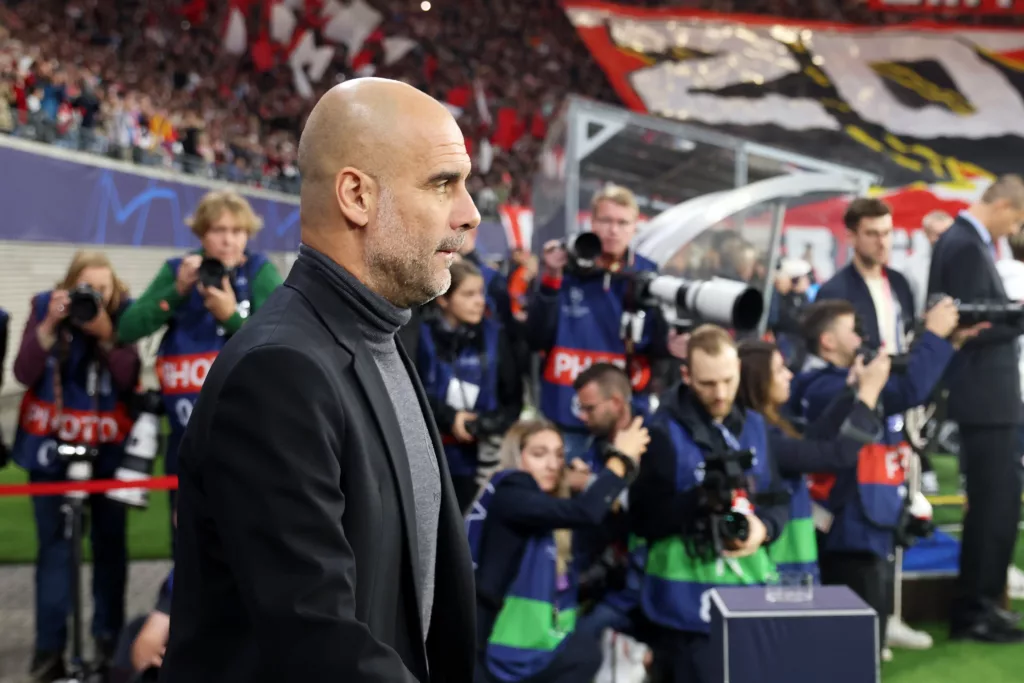 Pep Guardiola in the dugout