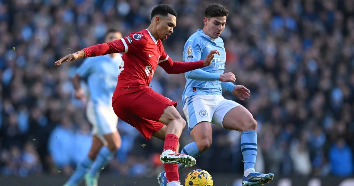 Liverpool and Man City in action