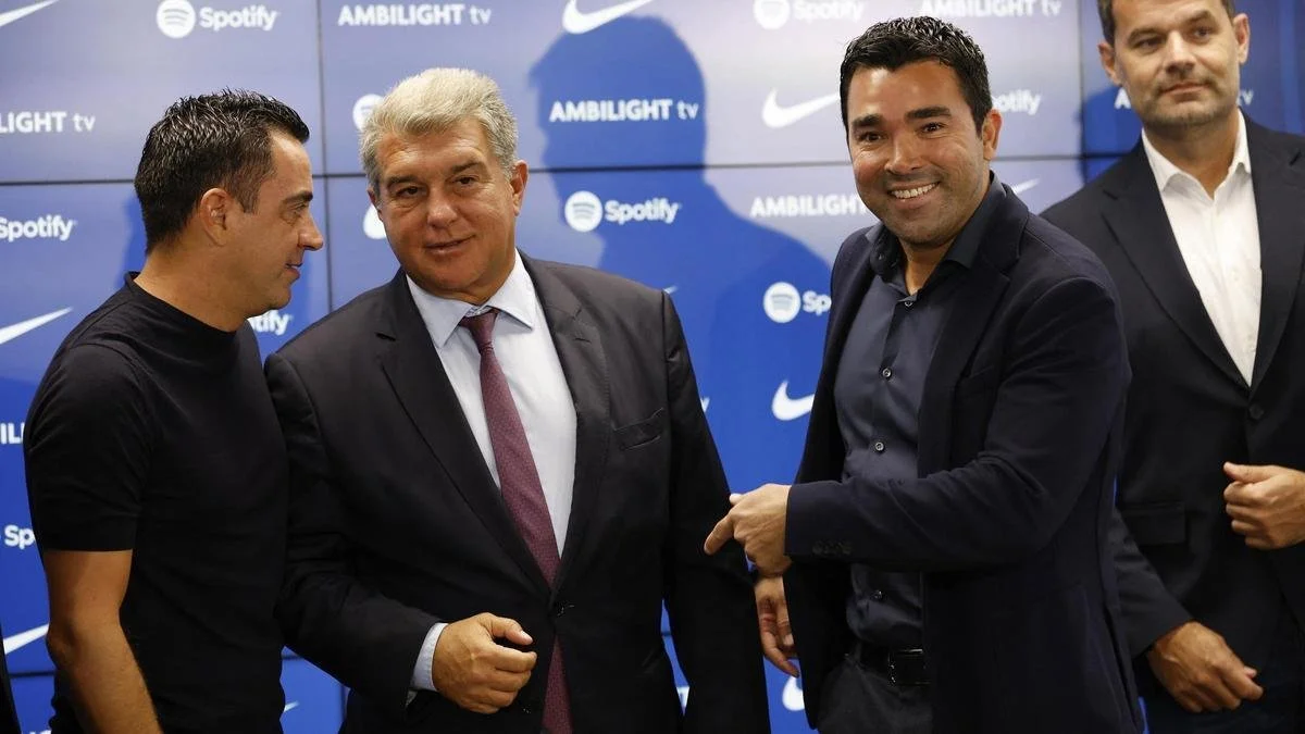 Xavi, Deco and Joan Laporta