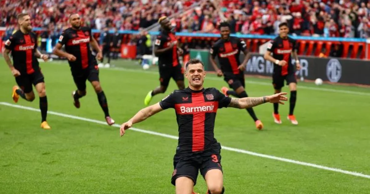 Bayer Leverkusen fans invade as club secure their first-ever Bundesliga title