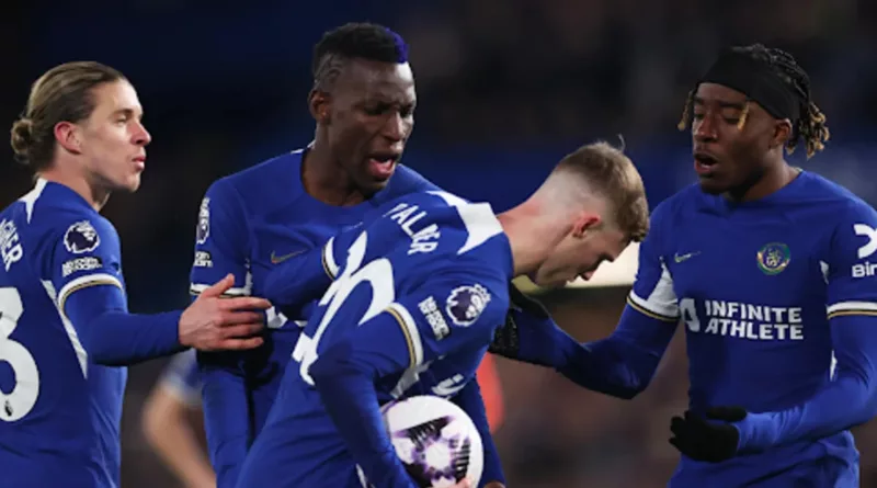 Chelsea players Nicolas Jackson and Noni Madueke argue over penalty kick