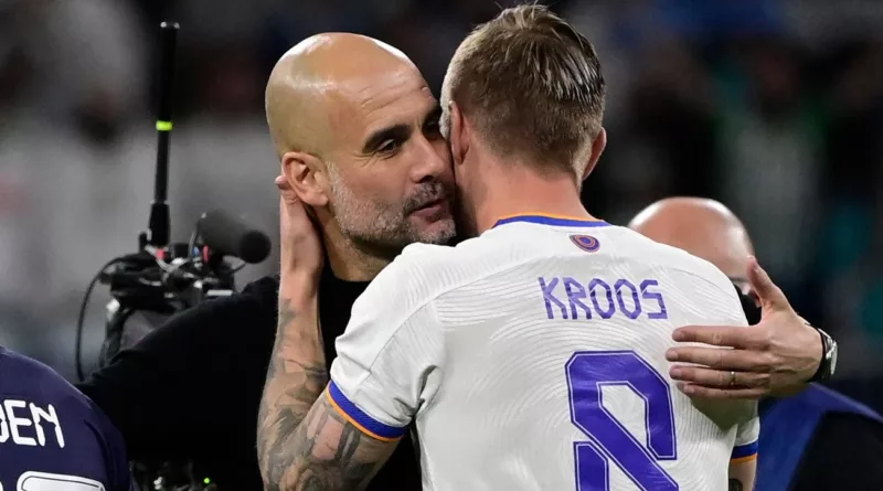 Pep Guardiola and Toni Kroos