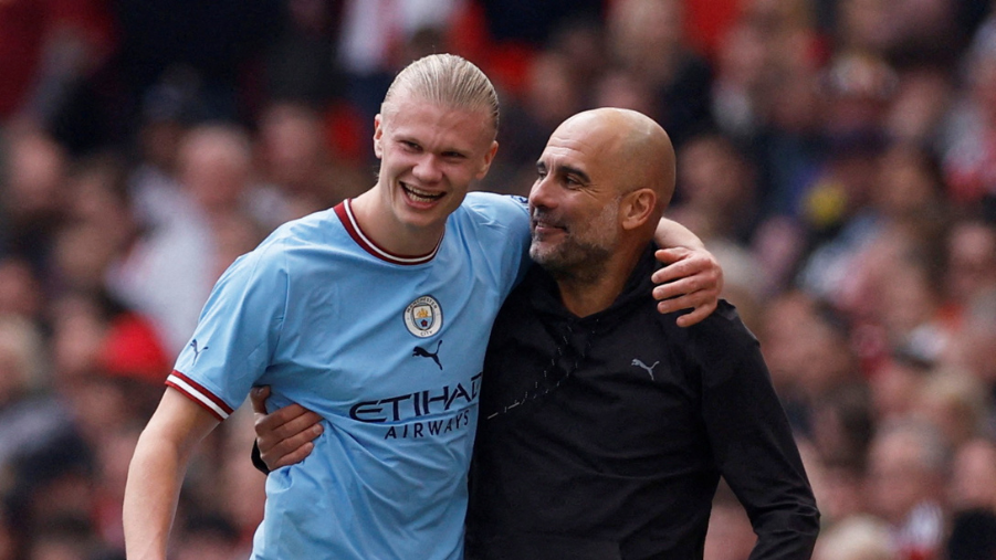 Pep Guardiola and Erling Haaland