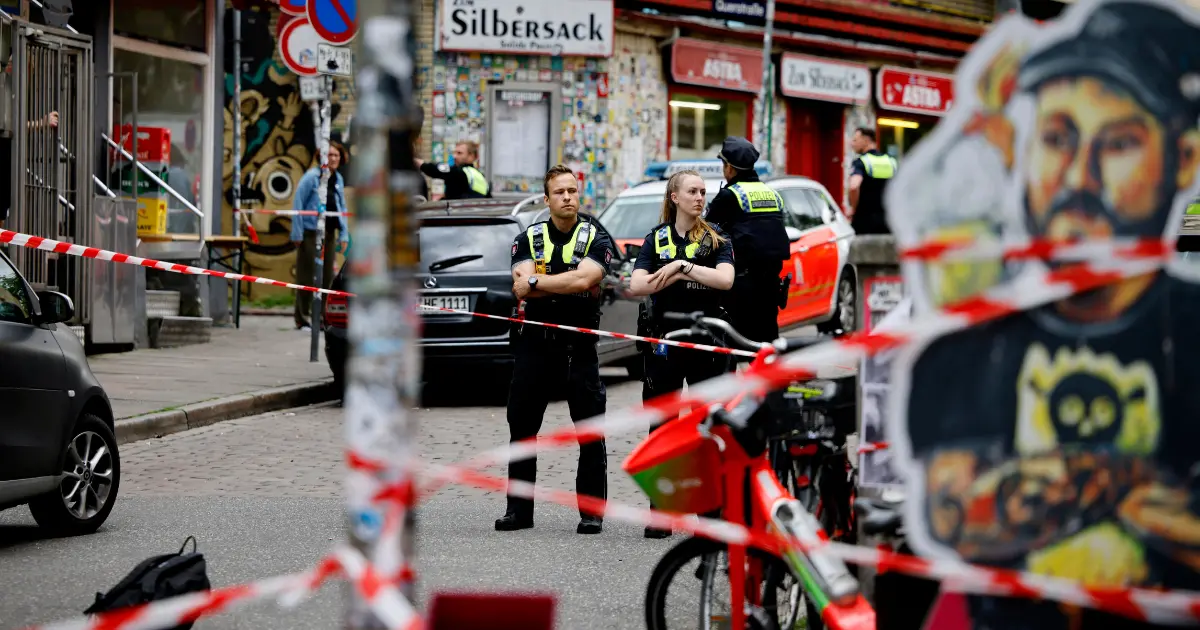 Why did Hamburg police shoot man with axe ahead of Poland vs Netherlands Game?