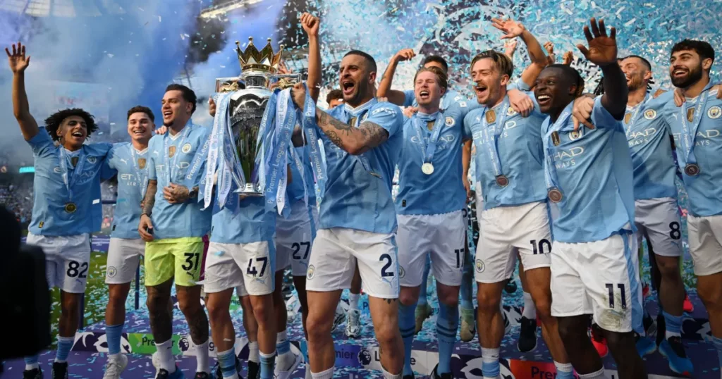 Manchester City lifting Premier League 2023-24 trophy