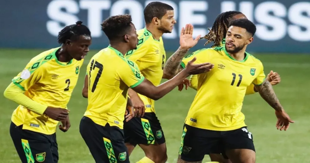 Jamaican players celebrate a goal