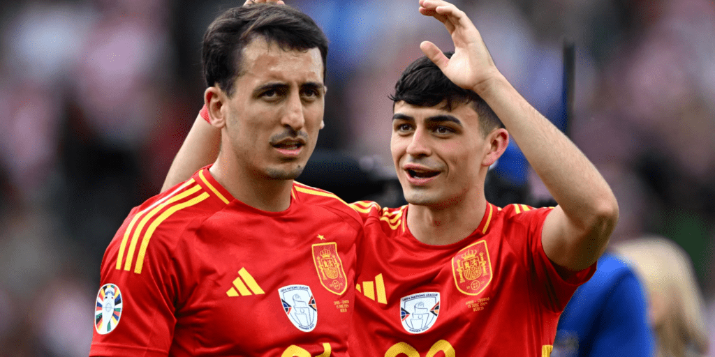 Pedri (R) celebrating with Mikel Oyarzabal