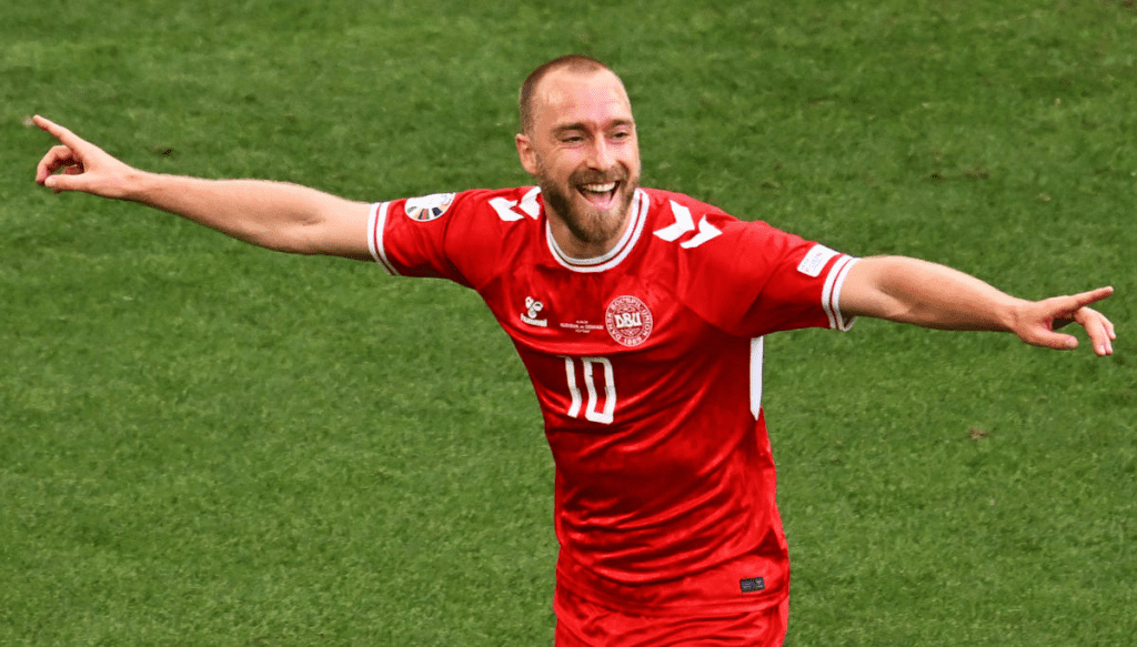 Eriksen celebrates scoring against Slovenia