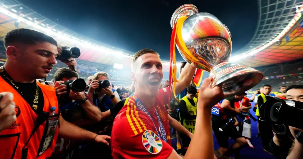 Dani Olmo with Euro 2024 trophy