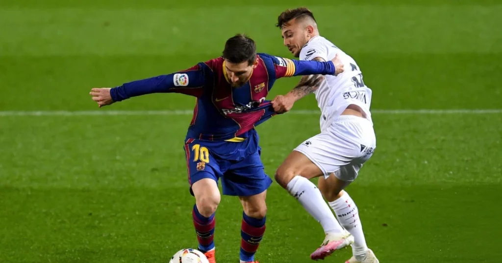 Lionel Messi with Pablo Maffeo