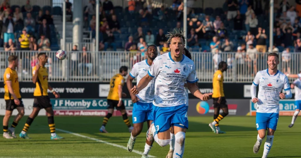 Theo Vassell celebrates after scoring Barrow's second goal during the Sky Bet League 2 match between Barrow and Newport County