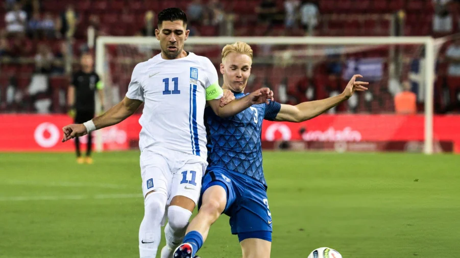 Tasos Bakasetas fights for the ball