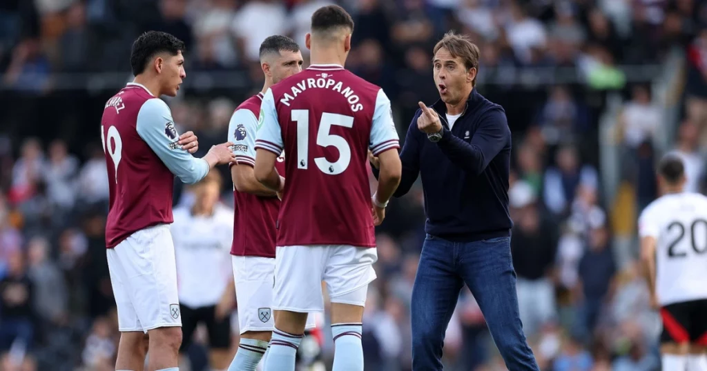 West Ham coach with their players