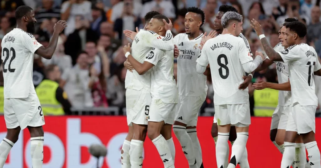 Real Madrid players celebrating a goal 