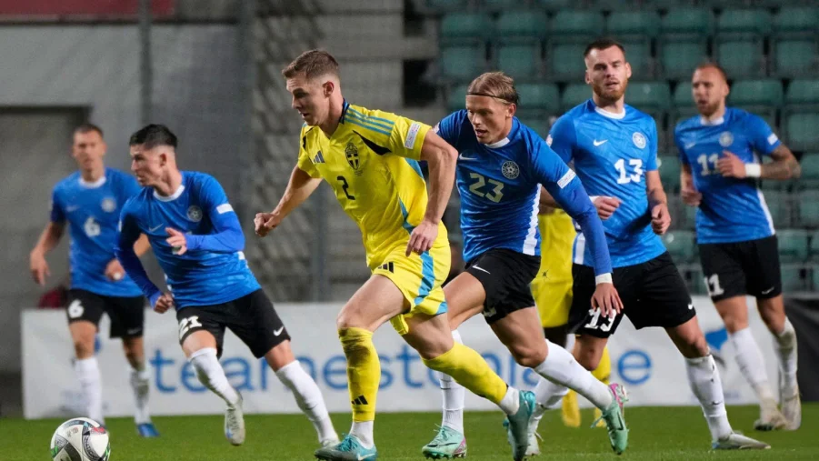 Vlasiy Sinyavskiy and Sweden's defender Emil Krafth vie for the ball during the UEFA Nations League