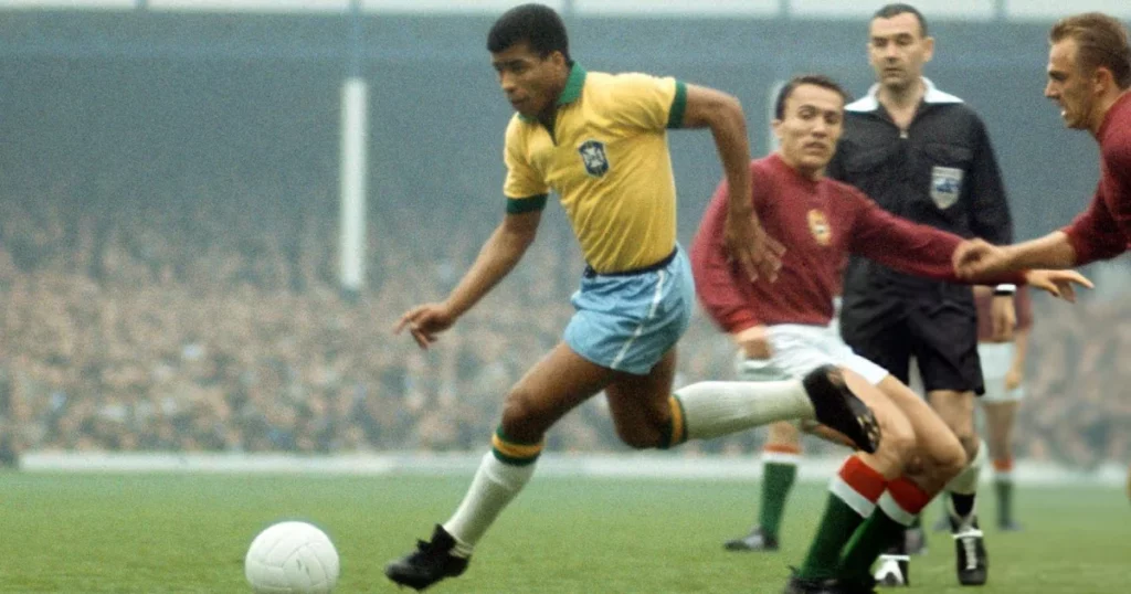 Jairzinho dribbling past the Hungary defense during the 1966 World Cup.