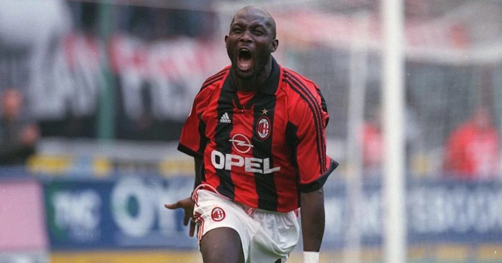 George Weah celebrates his goal