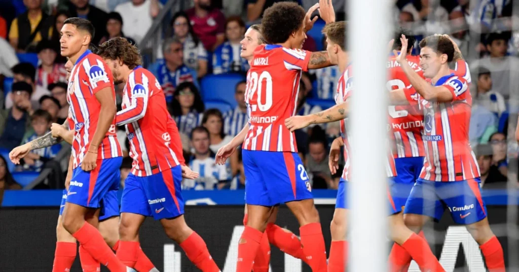 
Atletico Madrid players celebrating the goal 