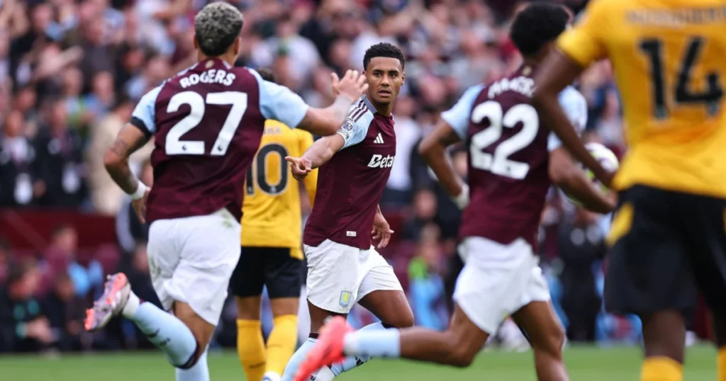 Villa players celebrating their goal against Wolves