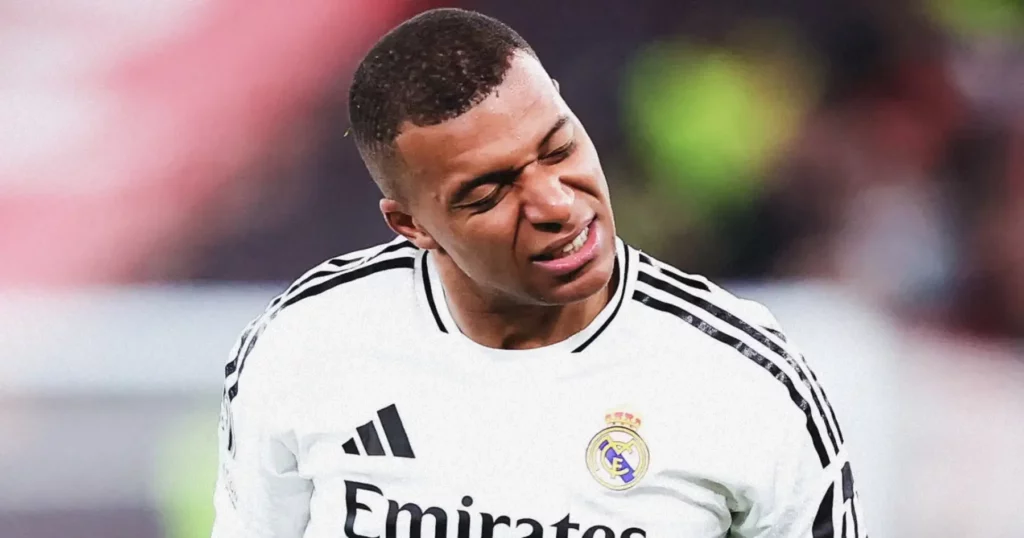 Kylian Mbappe reacts after missing a penalty