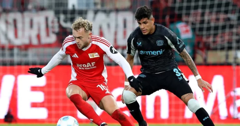 Union Berlin's Hollerbach shielding the ball