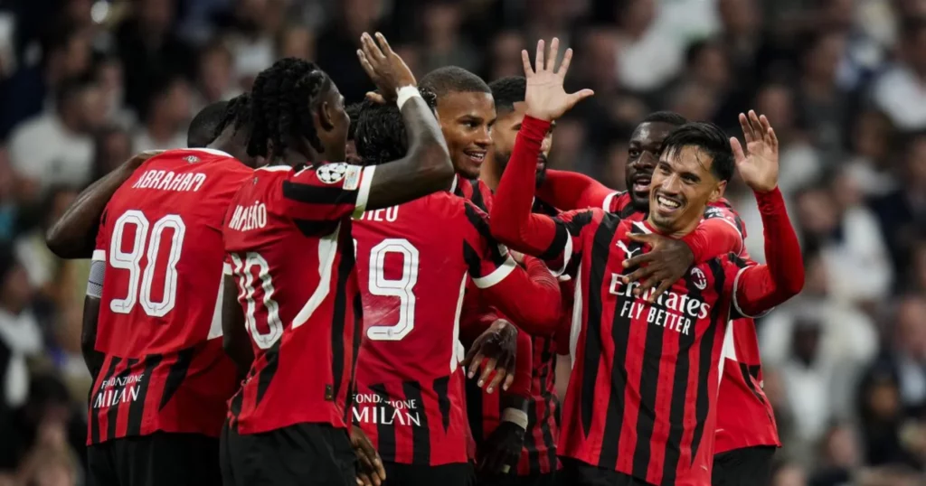 AC Milan celebrating their goal against Real Madrid