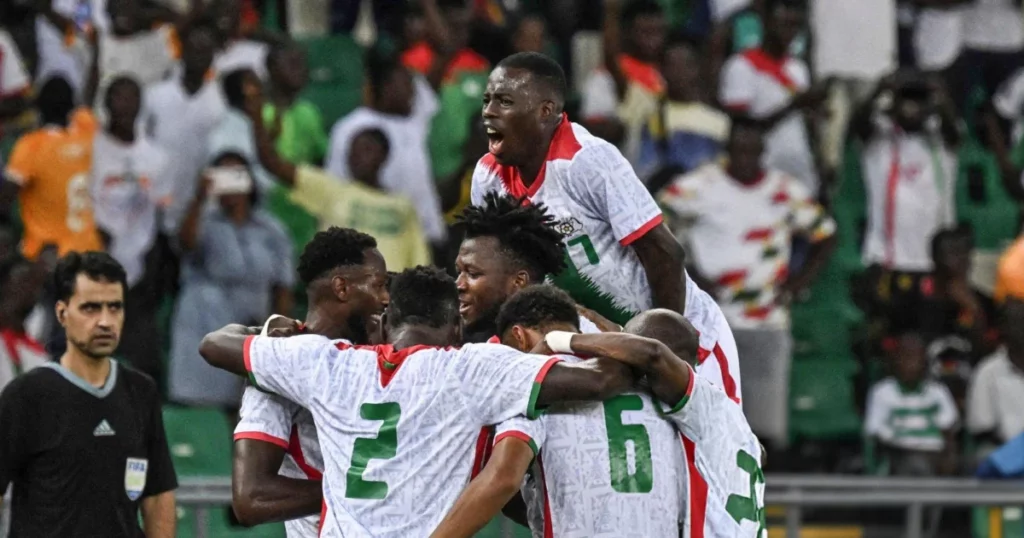 Burkina Faso's players celebrate after scoring a goal during