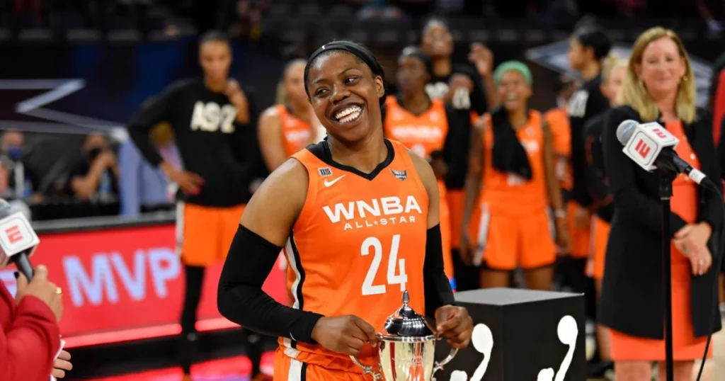 Arike Ogunbowale with trophy