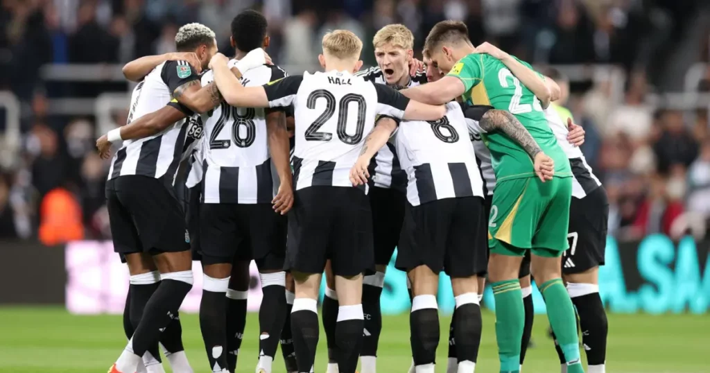 Newcastle United players in huddle