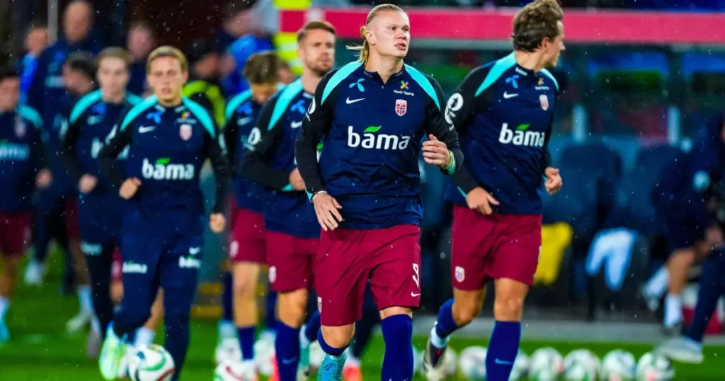 Norway players enter the pitch for warm-up ahead of the start of the UEFA Nations League League 