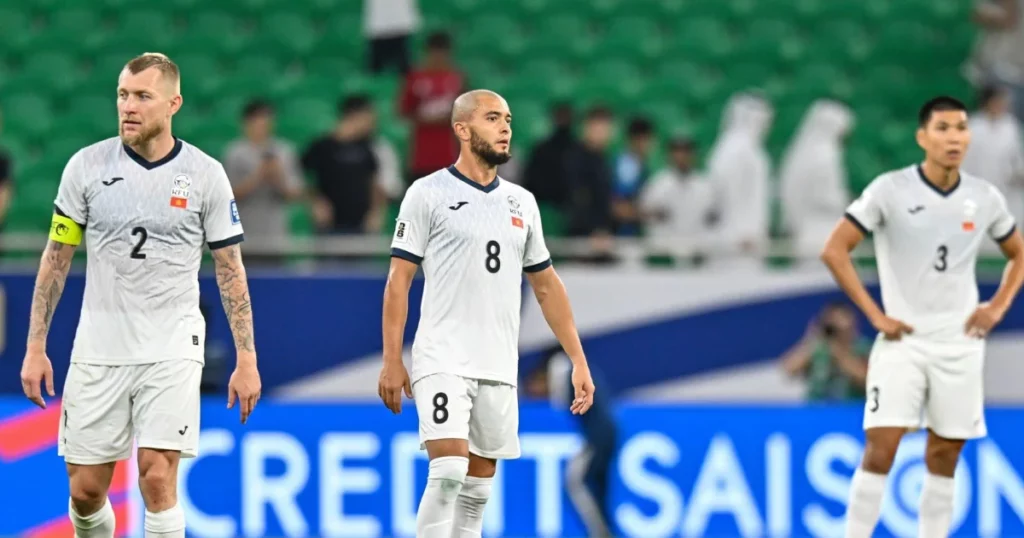 Players of Kyrgyzstan express their dejection after the FIFA World Cup 2026 AFC Asian Qualifiers 3rd round group A match between Qatar and Kyrgyzstan