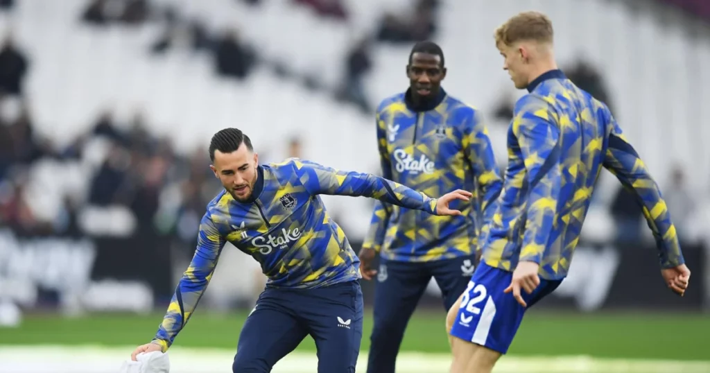 Everton players warm up before the game