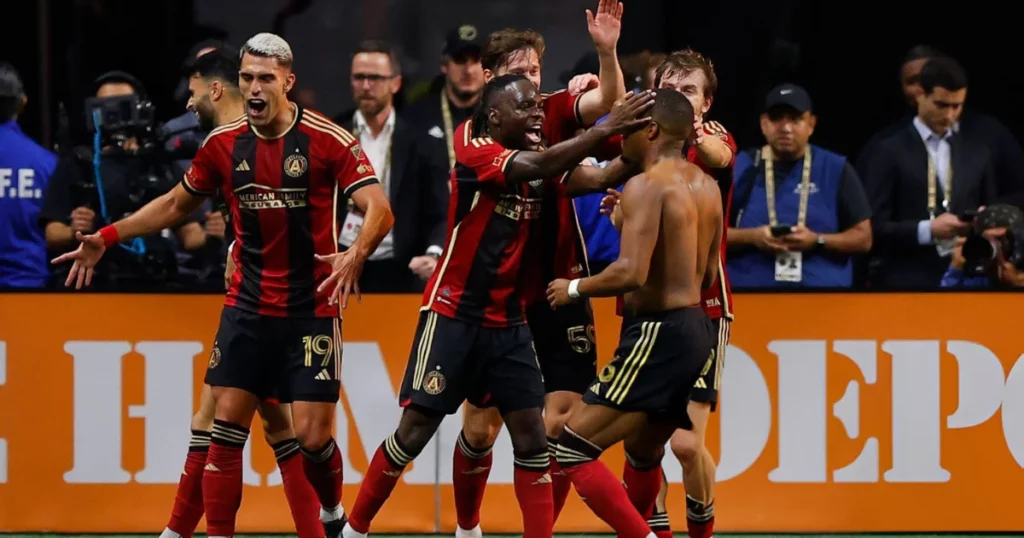 Atalanta United players celebrating their winner against Inter Miami