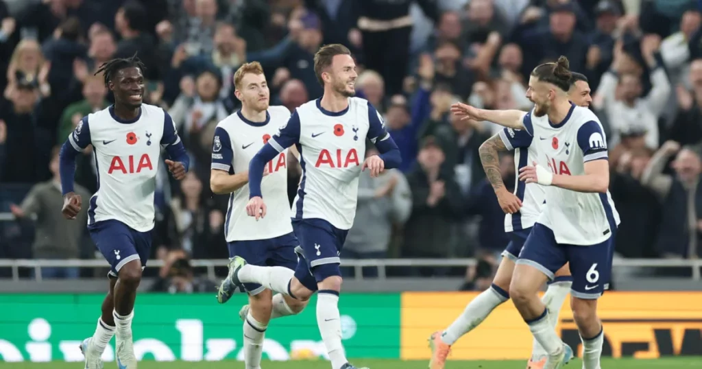 Tottenham players celebrating the free kick scored by James Maddison 