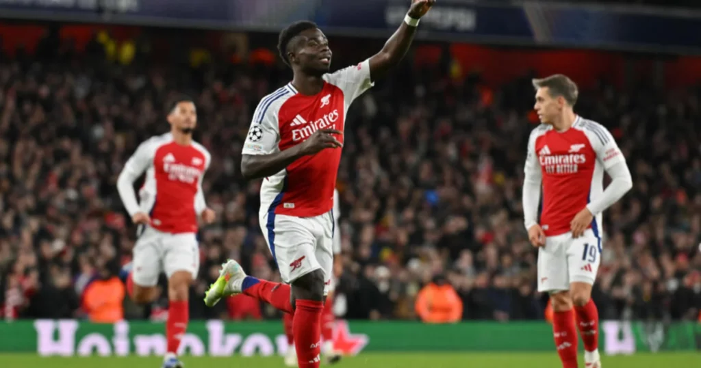 Arsenal players celebrating their goal against Monaco