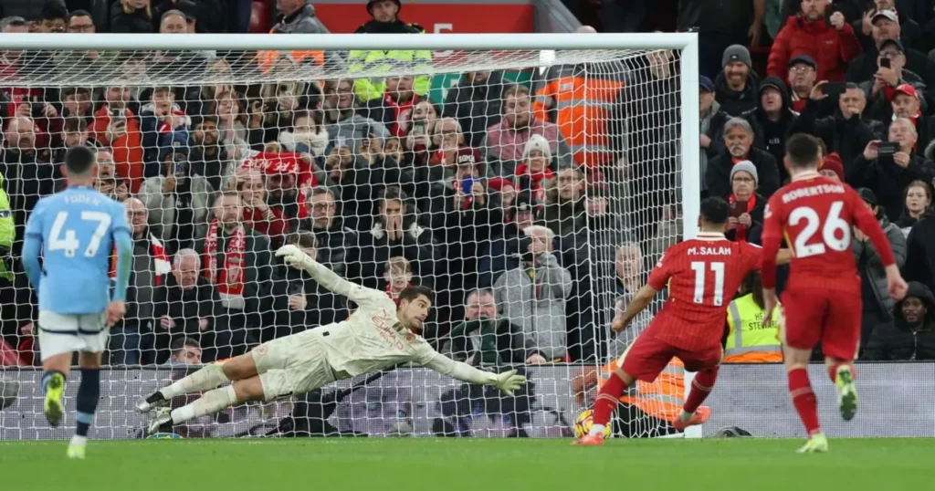 Manchester City's Ortega attempting a save