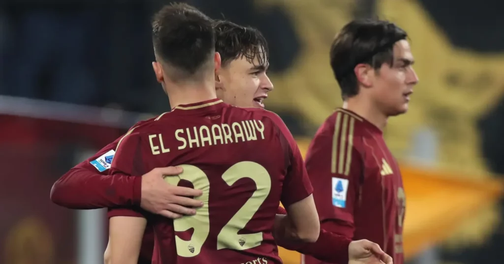 Roma players are celebrating their goal