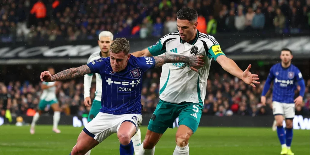 Ipswich players battling for the ball