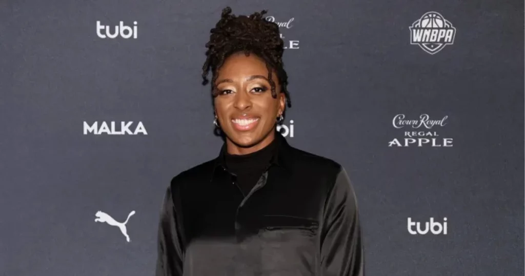 Nneka Ogwumike in an emerald green gown at the 2024 Sparks team gala.