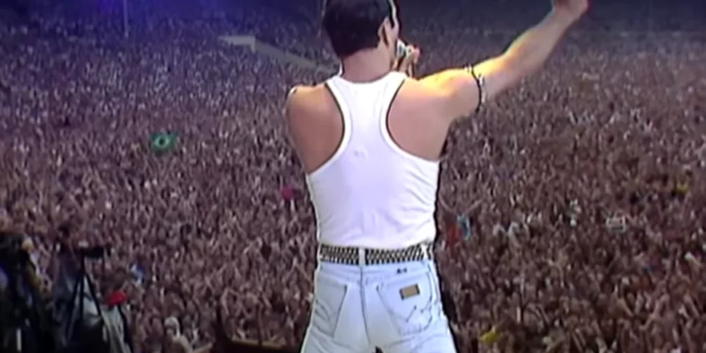 The iconic band Queen performing at the Old Wembley Stadium during the Live Aid 