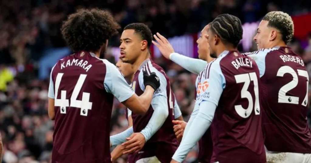 Aston Villa players celebrating their goal.