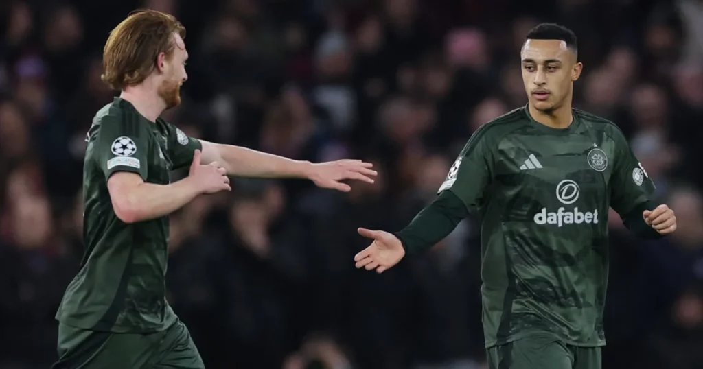 Celtic players celebrate levelling the game before half-time