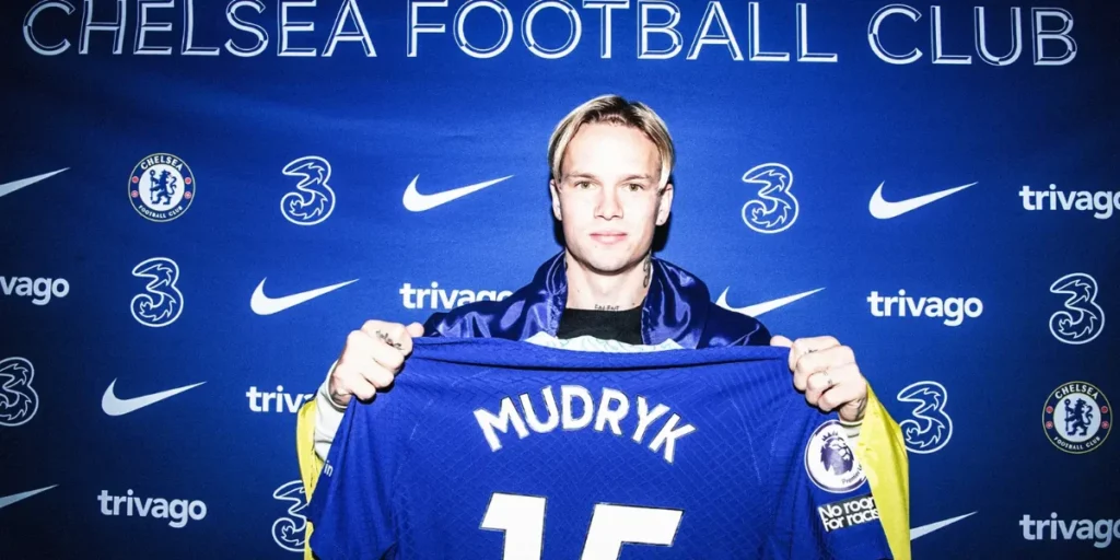 Mudryk posing for the cameras at his unveiling