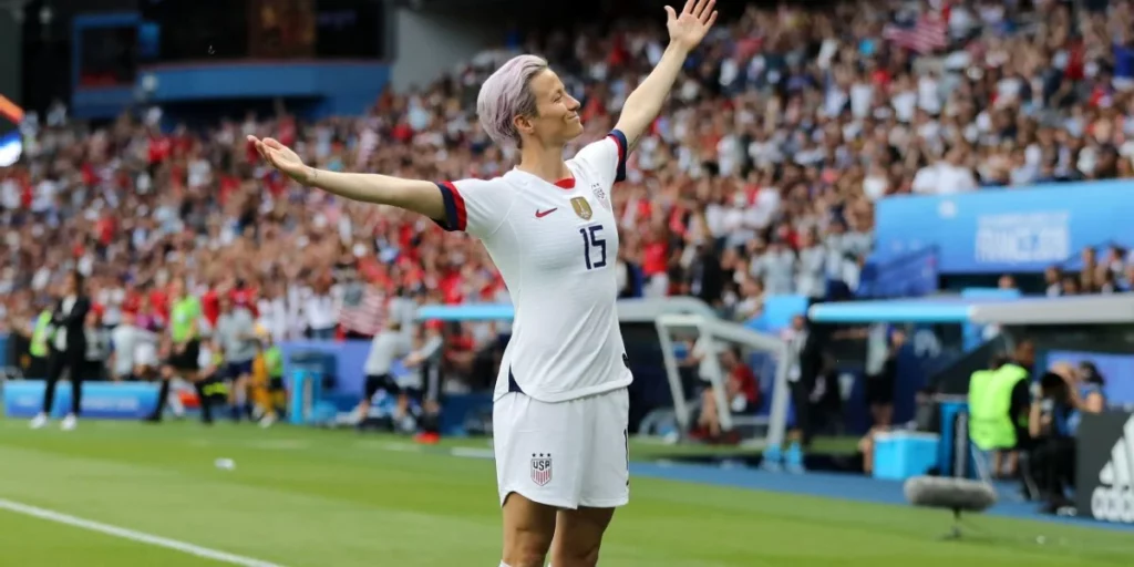 Megan Rapinoe hitting her iconic celebration