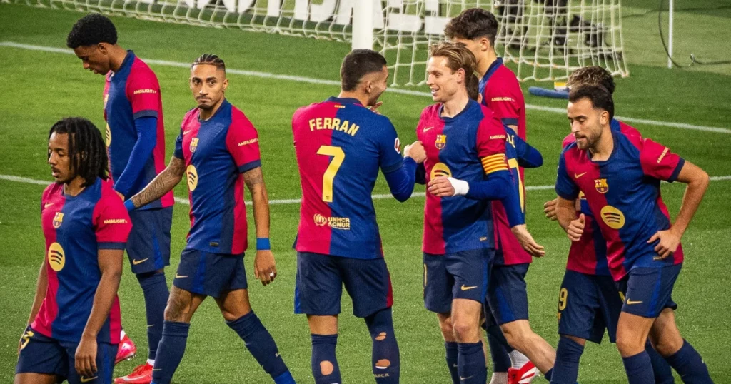 Barcelona players celebrating their goal against Valencia 