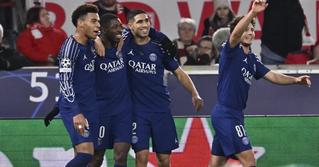 PSG Players celebrate one of their goals against Benfica 