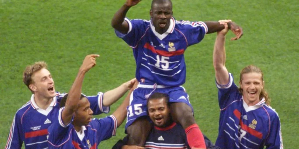 Lilian Thuram celebrating with his teammates