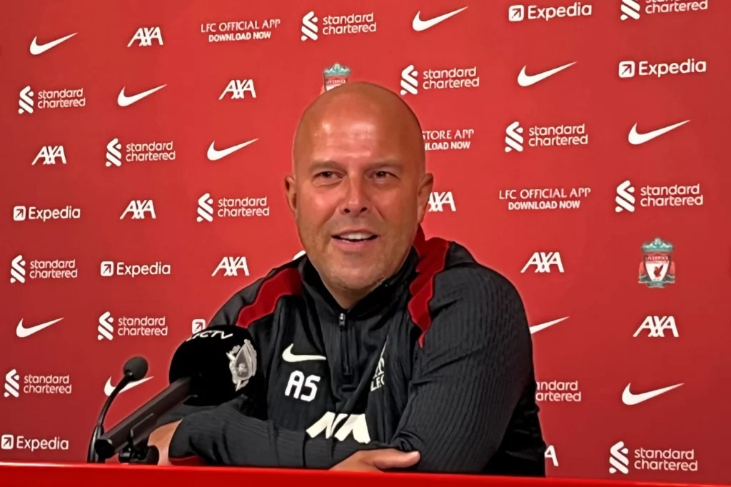 Arne Slot attending a press conference as Liverpool's manager.