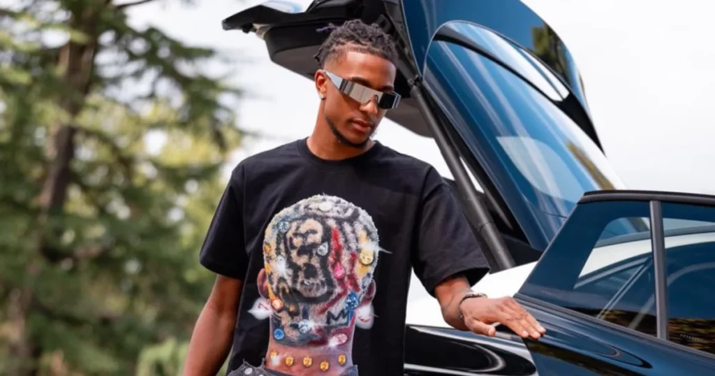 Michael Olise arriving for training in a Volkswagen 