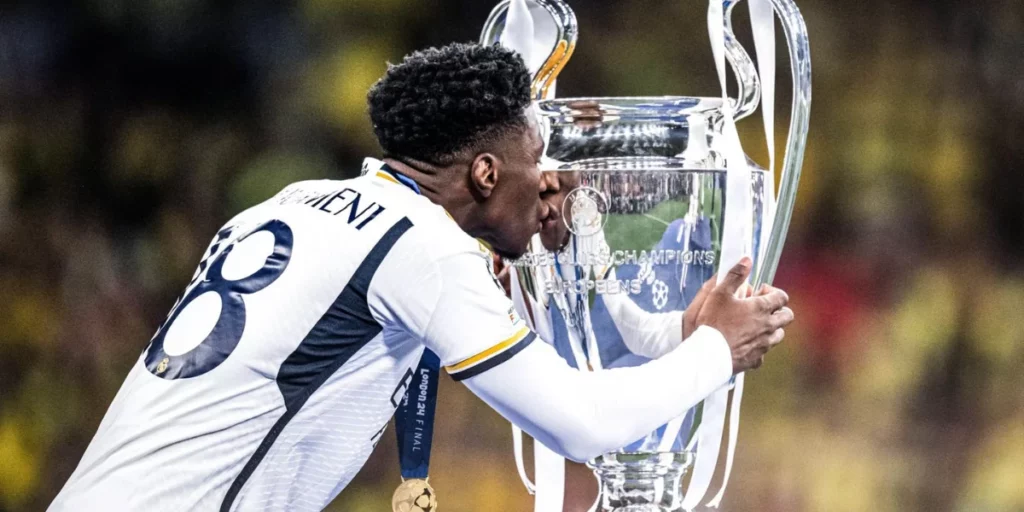 Aurelien Tchouameni kissing the Champions League title